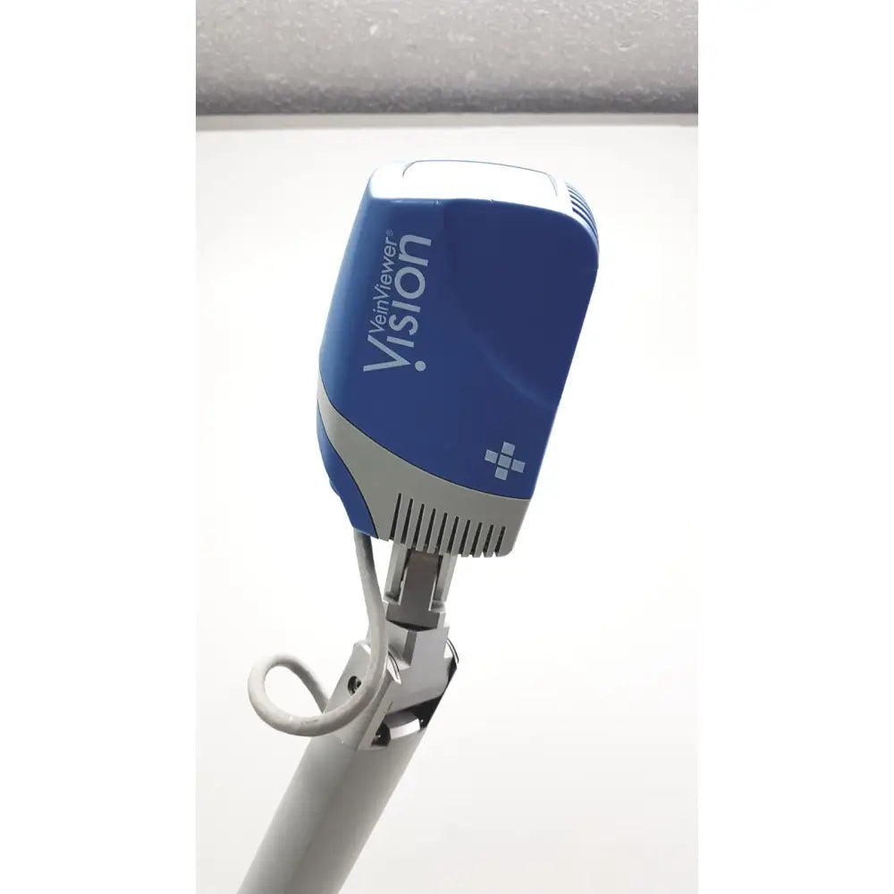 Blue and gray christie veinviewer vision vein device with ventilation slits and white cross logo for vision vein visualization