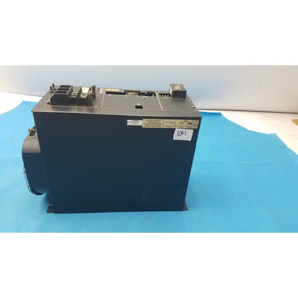 Dark blue industrial control box with black components and labeled stickers for cincinnati milacron c5 spindle drive