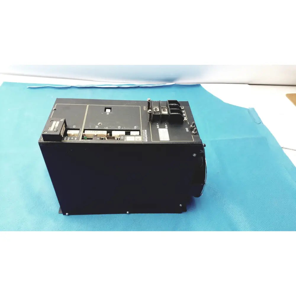 Black rectangular industrial milacron c5 spindle drive with matte finish and multiple labeled connectors on top surface