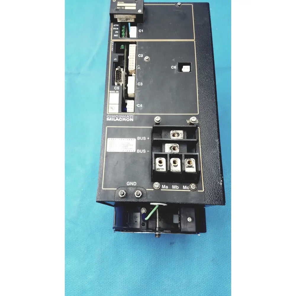 Black cincinnati milacron c5 spindle drive industrial control module showing labeled ports and terminal blocks on backside
