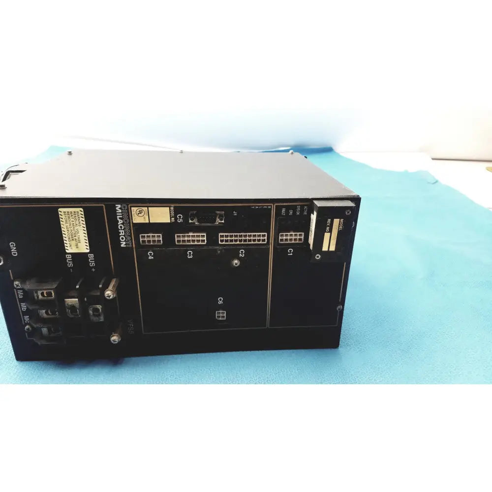 Black milacron c5 spindle drive industrial control module with labeled ports and connectors for cincinnati milacron use