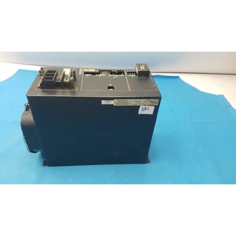 Dark blue industrial control panel of cincinnati milacron c5 spindle drive with multiple connectors and white label 104
