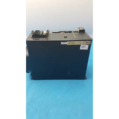 Black industrial control panel with metallic connectors and labeled stickers for cincinnati milacron c5 spindle drive