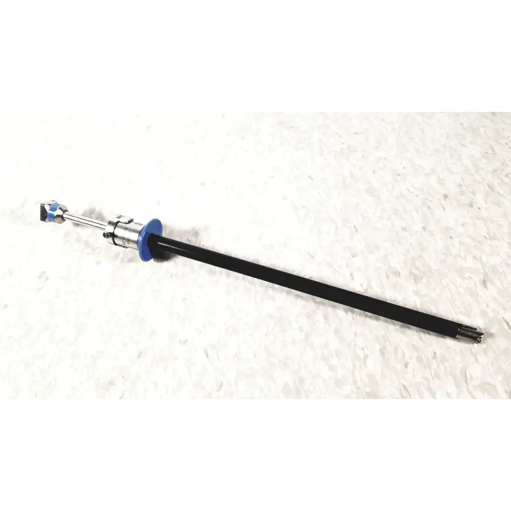 Black flexible endoscope with blue collar and metallic joints of circon acmi sheath esrs-28 with etor-28 obturator