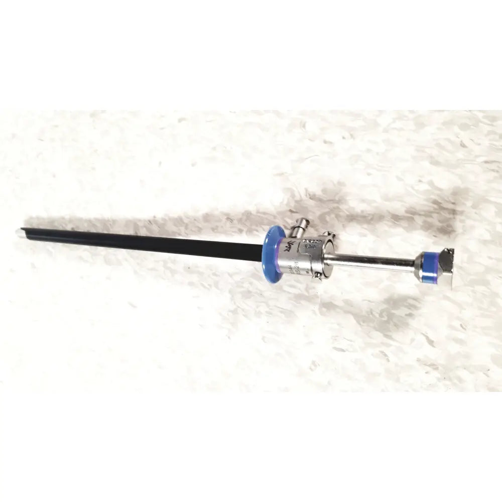 Silver surgical instrument with black shaft and blue grips for circon acmi sheath esrs-28 with etor-28 obturator