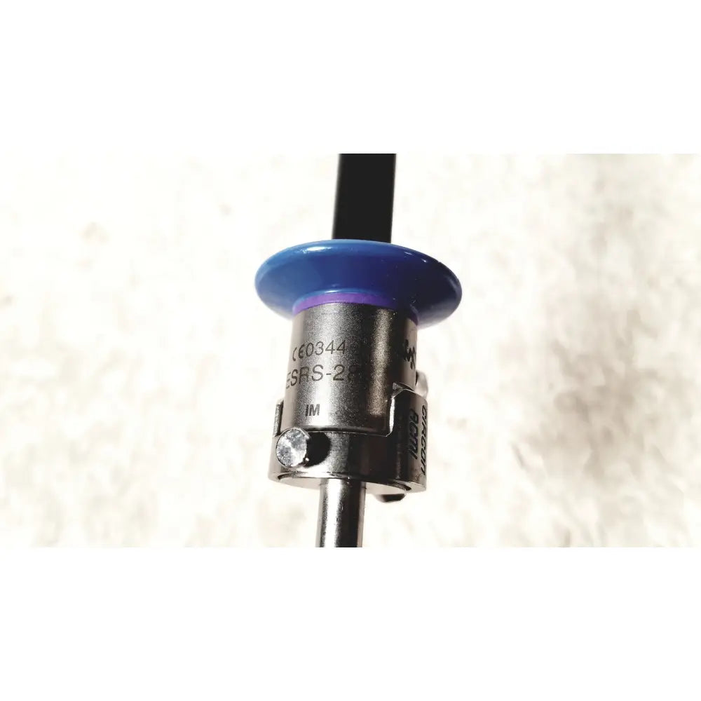 Blue plastic cap on metallic shaft of circon acmi sheath esrs-28 with etor-28 obturator medical instrument