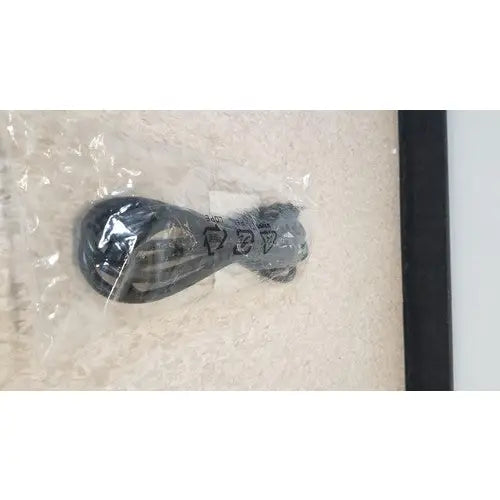 Black coiled usb cable wrapped in clear plastic packaging for cisco 5500 series wireless lan controller model 5508