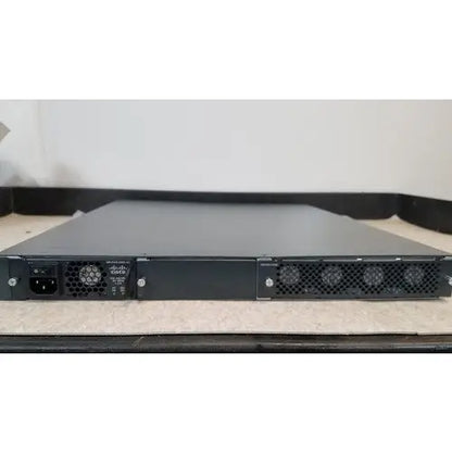Black cisco 5500 series wireless lan controller model 5508 back with ventilation grilles and dual ac power ports