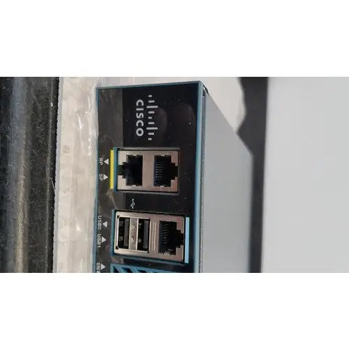 Cisco 5500 series wireless lan controller model 5508 with black and silver ports and sleek metallic finish back view