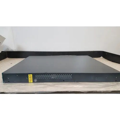 Black rectangular cisco 5500 series wireless lan controller model 5508 with perforated front panel and yellow warning label