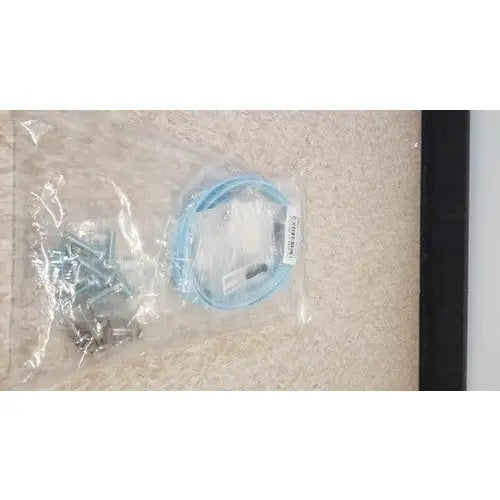 Light blue coiled cable in clear plastic bag for cisco 5500 series wireless lan controller model 5508 lan controller model