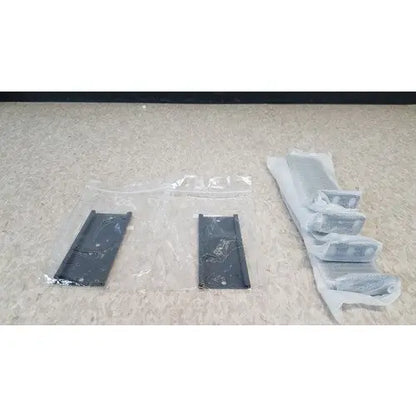 Black plastic mounting brackets in protective wrapping for Cisco 5500 series wireless lan controller model 5508