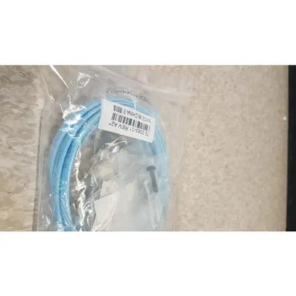 Light blue coiled cable in clear plastic packaging for cisco 5500 series wireless lan controller model 5508