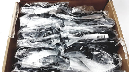 Black plastic safety goggles in clear packaging suitable for reuse medical and office desk accessories use