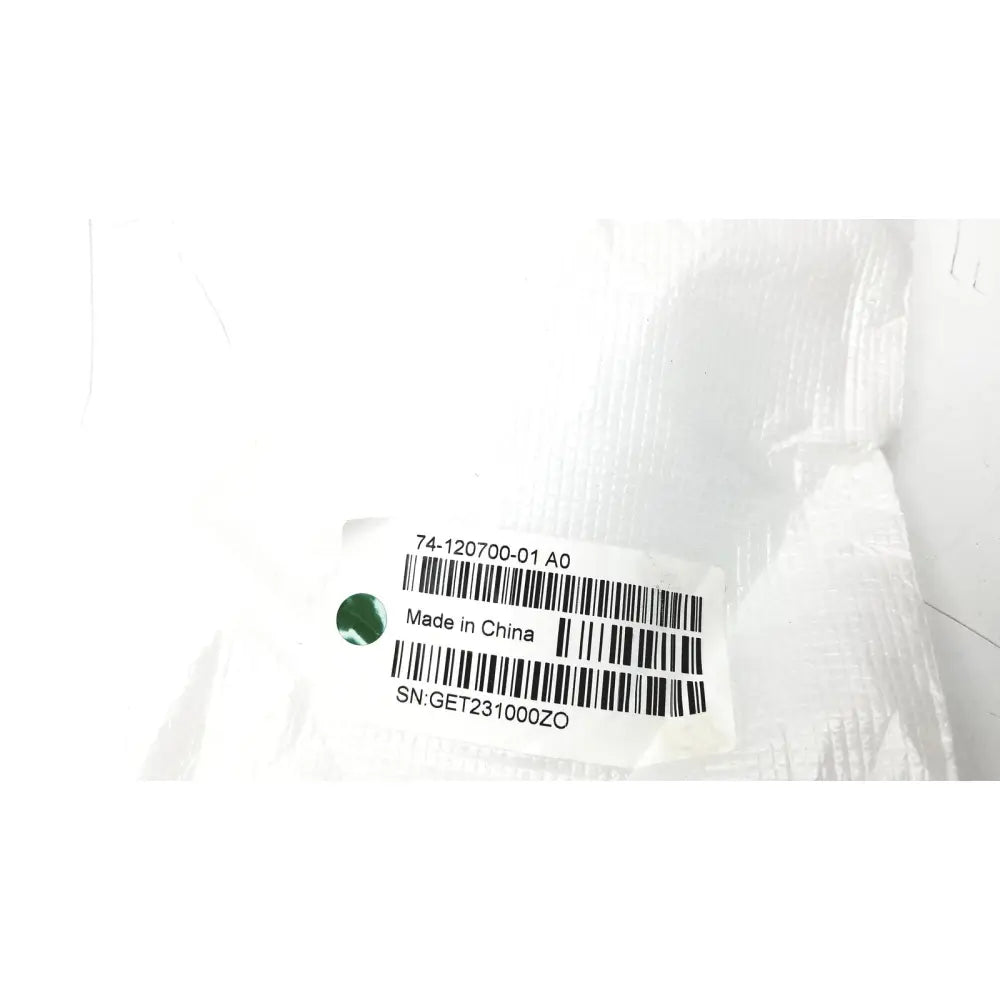 White plastic label on the back of cisco cs-mic-table-e table microphone with euroblock plug showing barcode and serial number
