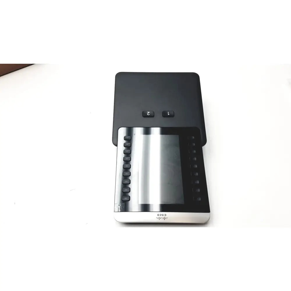 Black cisco ip phone with silver accents and touchscreen display featuring cisco ip phone key expansion module