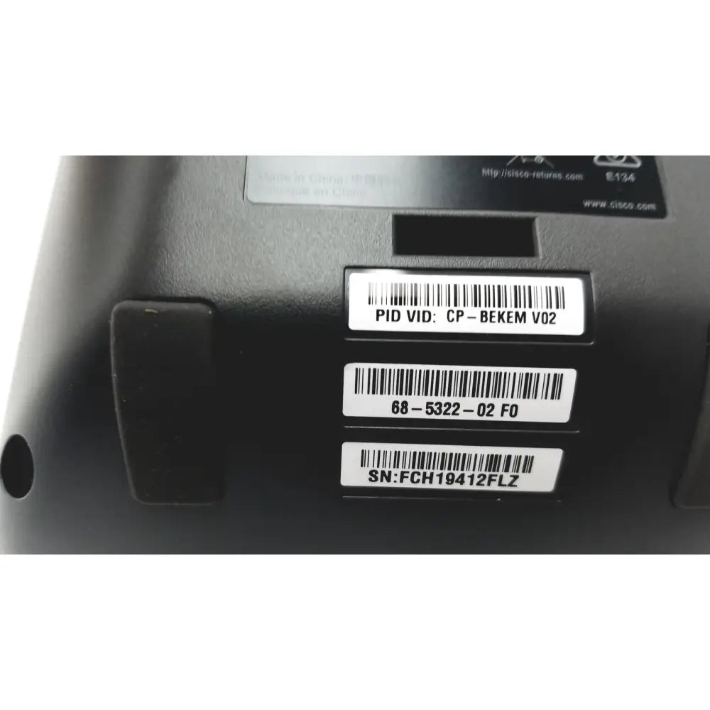Black plastic cisco ip phone key expansion module back side showing usb port and memory card slot for enhanced functionality