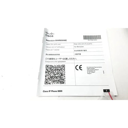 White paper document with black text and barcode featuring the Cisco logo for Cisco IP Phone key expansion module