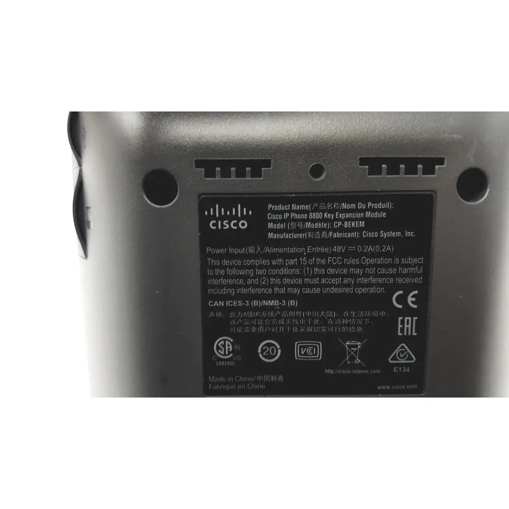 Gray cisco ip phone 8800 key expansion module with black label showing specifications and certifications on the back side