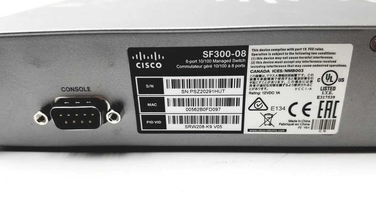Cisco sf300-8 8-port managed switch with black console port and silver metal casing for network management