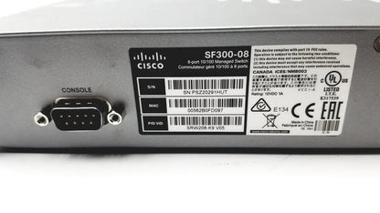 Cisco sf300-8 8-port managed switch with black console port and silver metal casing for network management