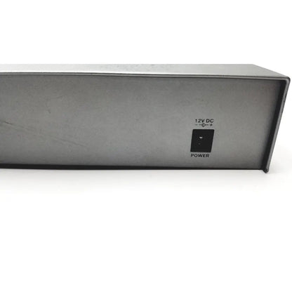 Gray metal power supply unit with black power switch and 12v dc indicator on the back of cisco sf300-8 managed switch