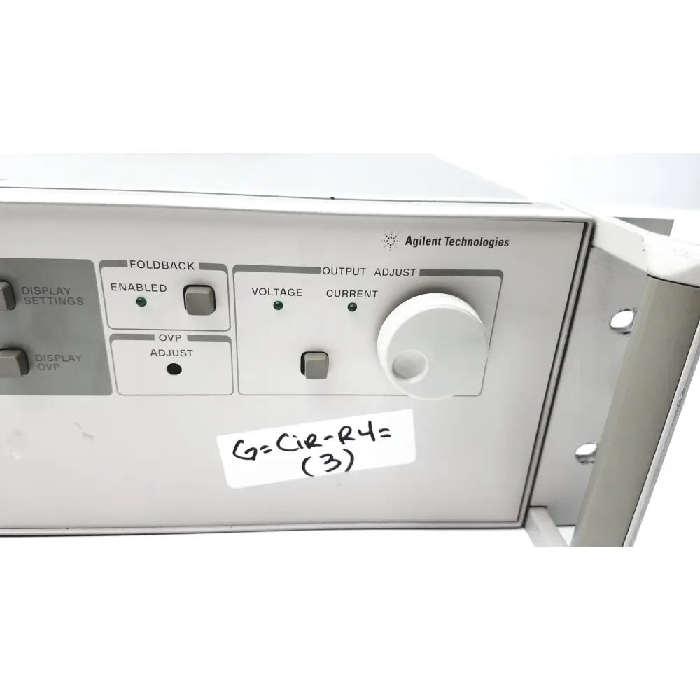 Silver metal rack-mountable agilent technologies panel with labeled controls and white knob for cisco wae wide area application engine