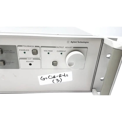 Silver metal rack-mountable agilent technologies panel with labeled controls and white knob for cisco wae wide area application engine