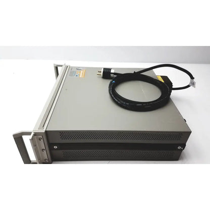 Gray metal cisco wae 600 series server rack with coiled black power cable for wide area application engine use
