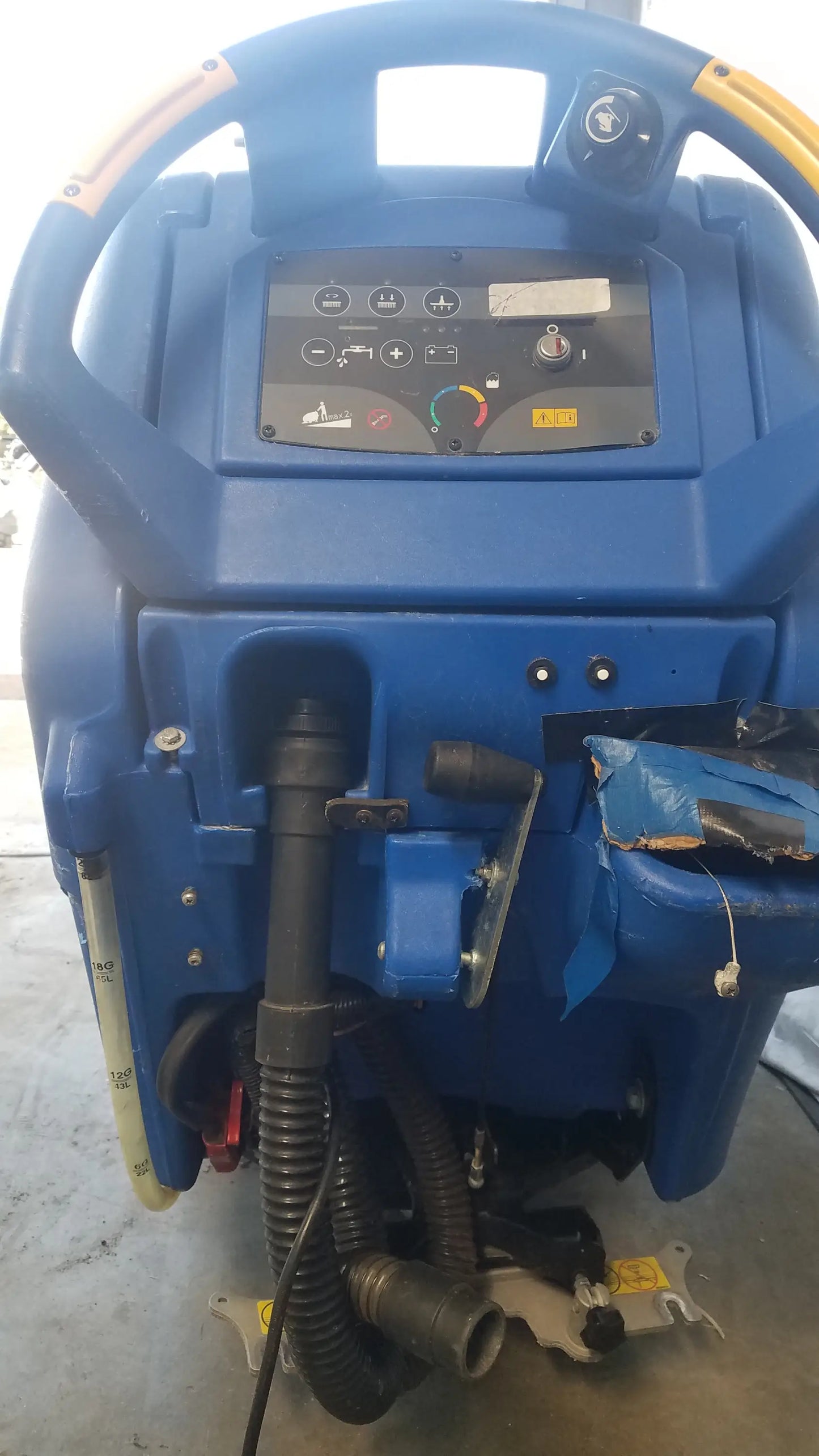 Blue clarke focus ii boost floor scrubber with yellow handle grips and control panel for industrial floor cleaning machine