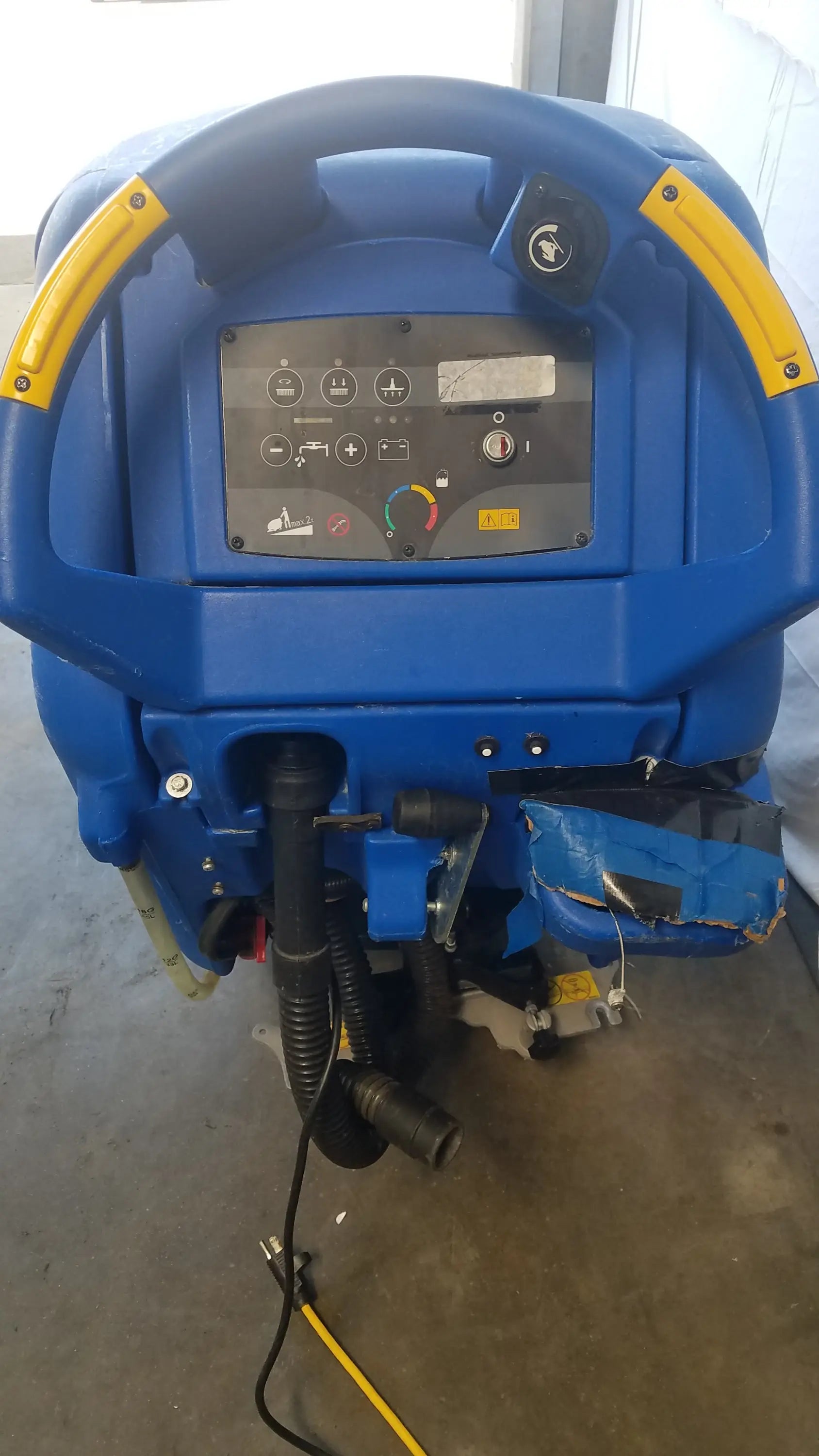 Blue Clarke Focus II Boost 28 floor scrubber with yellow handle grips and control panel for industrial floor cleaning machine