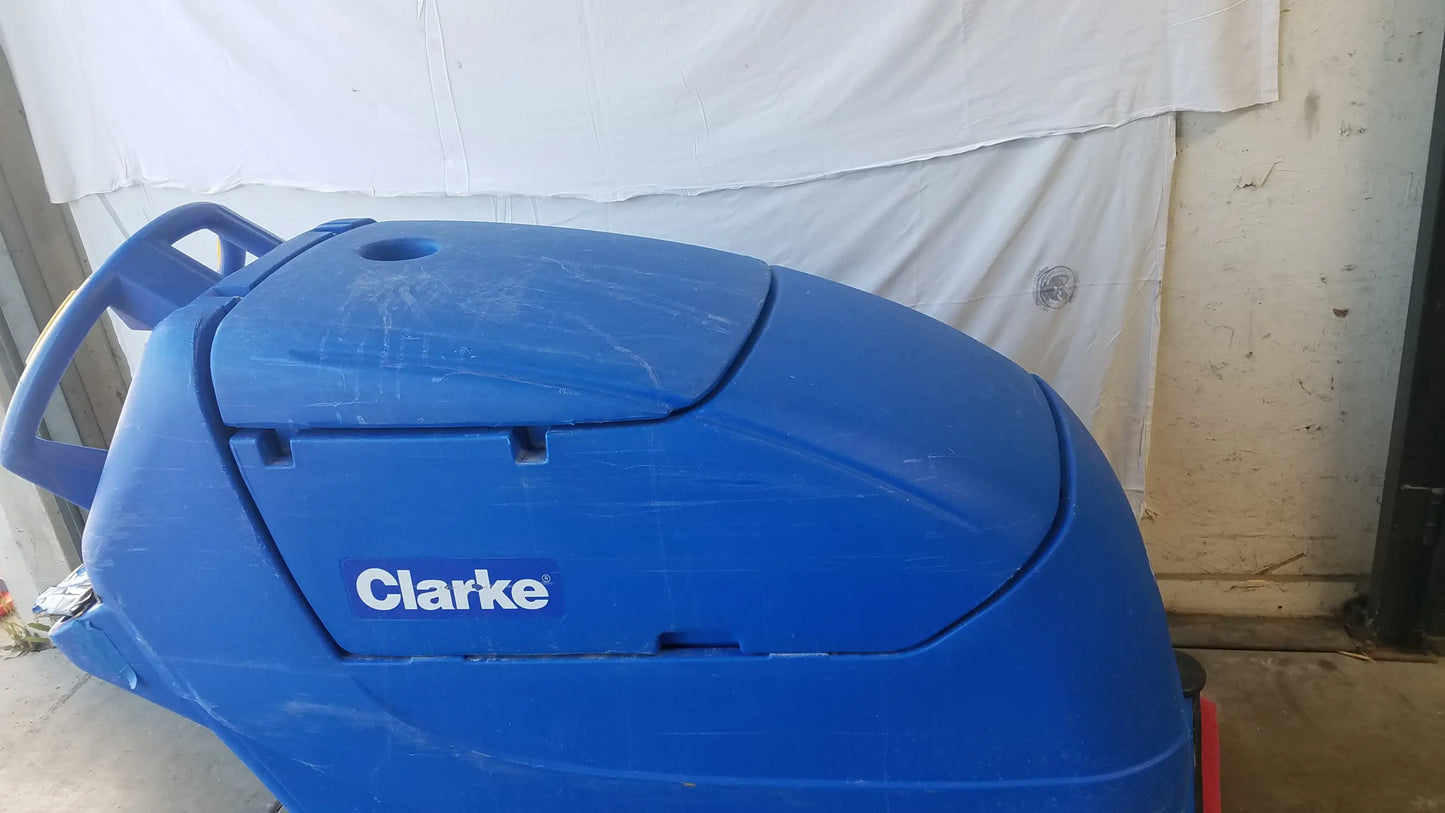 Blue Clarke focus ii boost floor scrubber with sturdy plastic body and ergonomic handle for efficient floor cleaning machine use