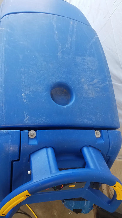 Blue plastic Clarke Focus II Boost floor scrubber with yellow accents and circular top opening for industrial cleaning