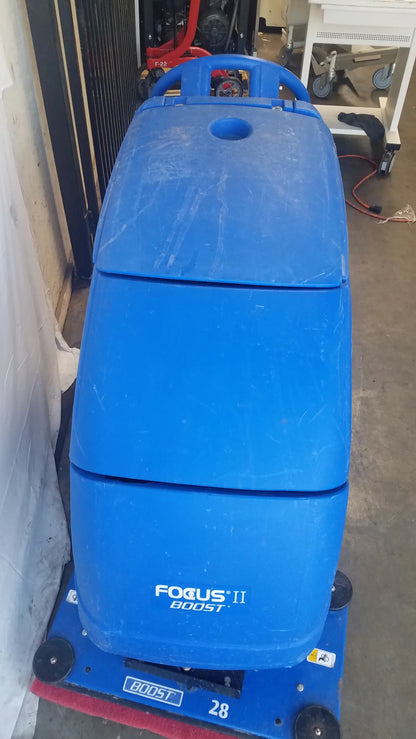 Blue plastic clarke focus ii boost floor scrubber with red brush at the front industrial floor cleaning machine s n n4000021676