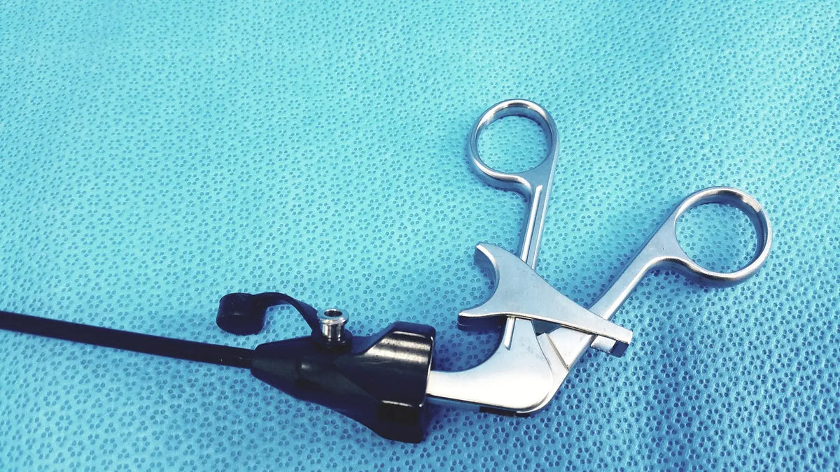 Claw gasper silver surgical forceps with black handle and attached cable for precise reuse medical laparoscopic instruments