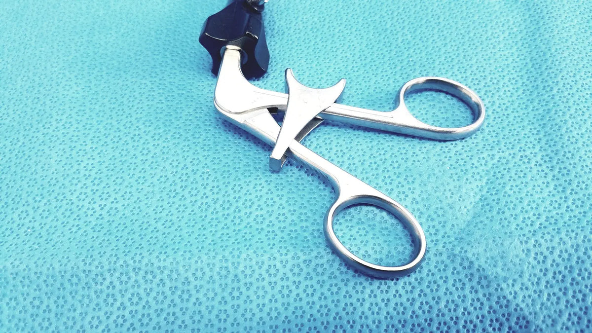 Silver claw gasper surgical forceps with black ergonomic handle designed for reuse medical and laparoscopic instruments use