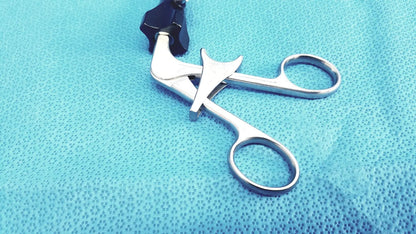 Silver claw gasper surgical forceps with black ergonomic handle designed for reuse medical and laparoscopic instruments use