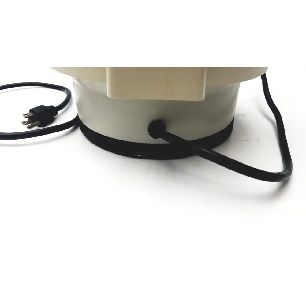 Cream-colored cylindrical fan base with black power cord and plug of clay adams roche model 0171 analytical centrifuge