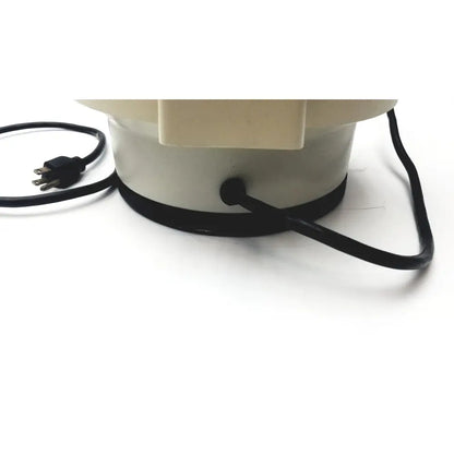 Cream-colored cylindrical fan base with black power cord and plug of clay adams roche model 0171 analytical centrifuge