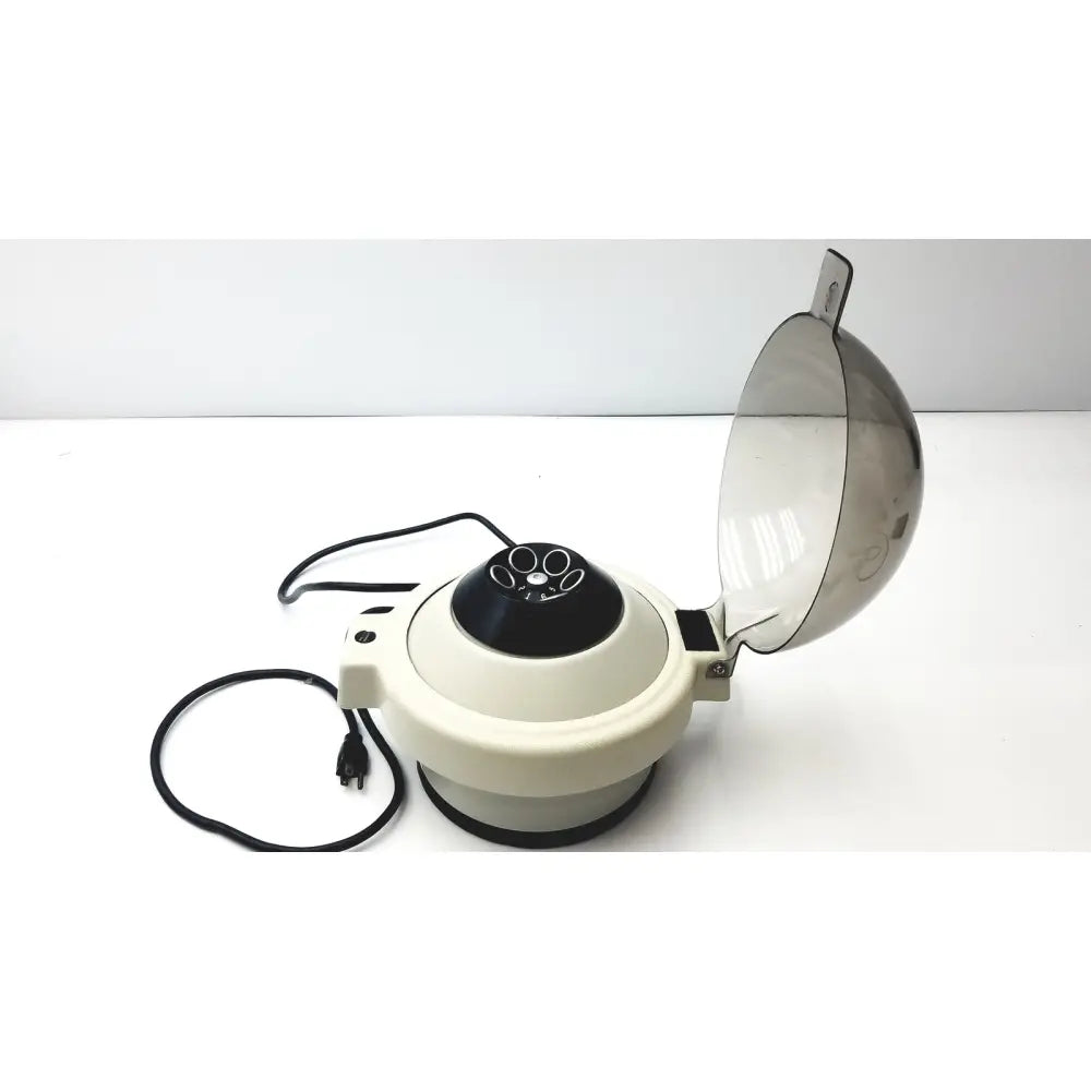 Cream-colored clay adams roche model 0171 analytical centrifuge with black top and transparent dome lid for reuse medical labs