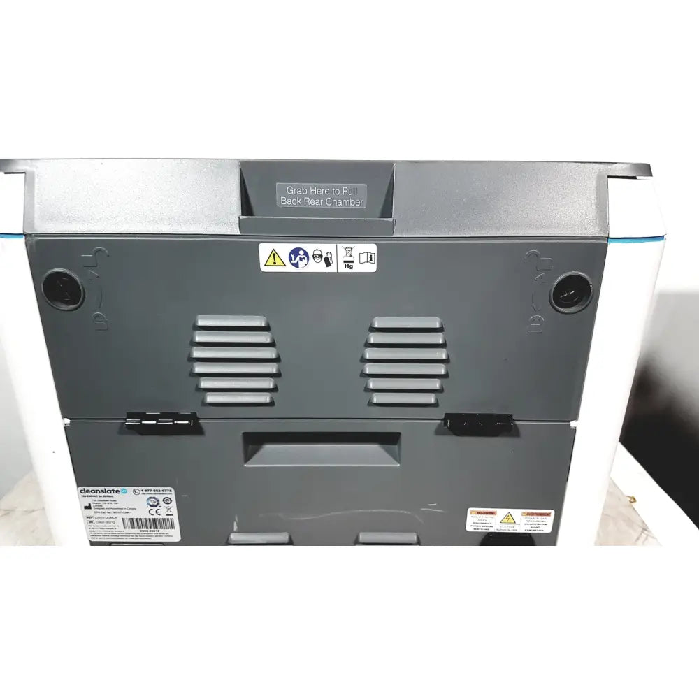 Back side of gray and white cleanSlate UV csuv-ug6cx mobile device sterilizer with ventilation slats and pull back label
