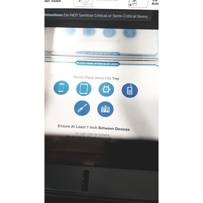 Blue circular icons on a white tray instruction sheet for cleanSlate uv CSUV-UG6CX mobile device sterilizer system