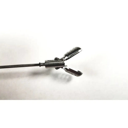Silver surgical instrument with long slender shaft and curved jaws clickline forceps insert replacement part