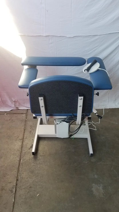 Blue padded clinton 6341 power series blood drawing chair with white metal frame and adjustable armrests for blood drawing