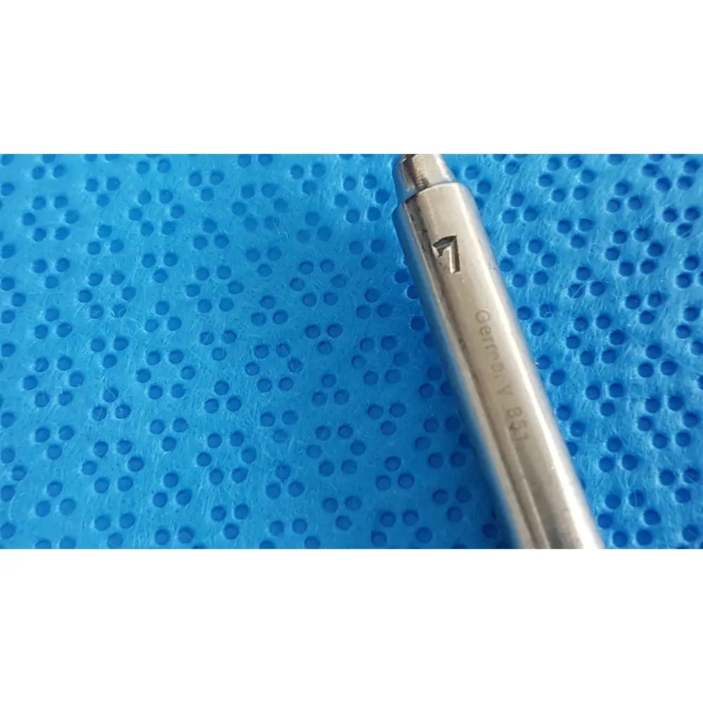 Silver metallic codman debakey mall surgical pen engraved germany 857 with notch near tip from debakey mall surgical set