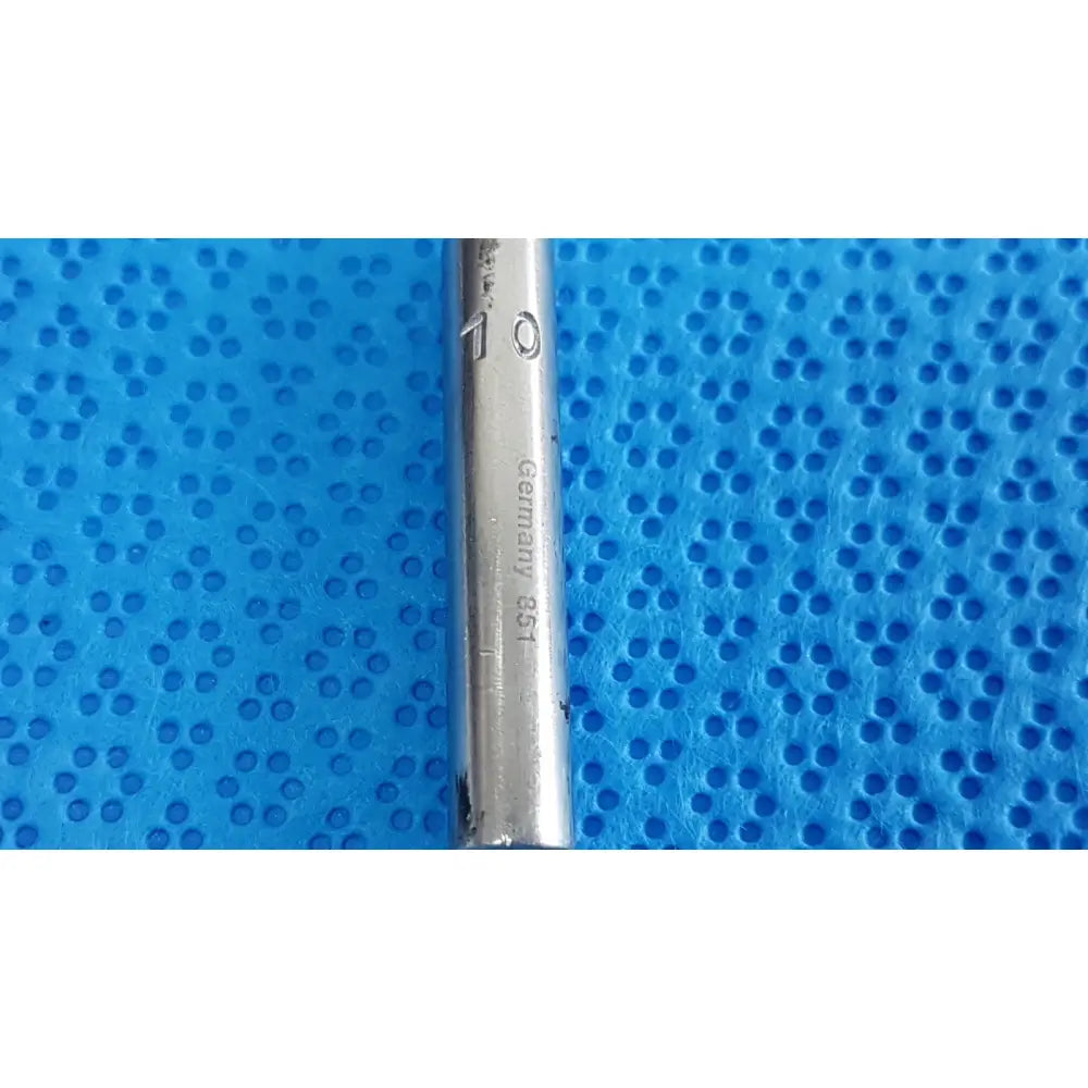 A sleek metallic 10mm precision drill bit with chrome finish from codman debakey mall surgical instrument set