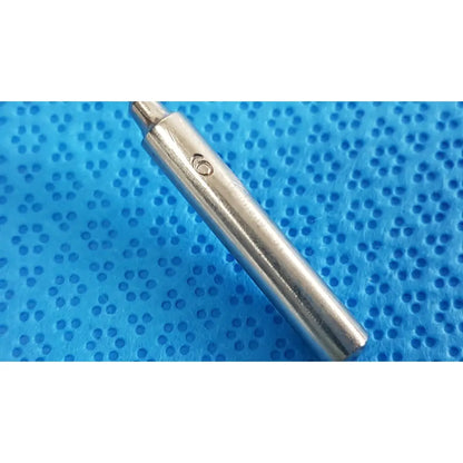 Silver-colored metal drill bit with pointed tip marked 6 in the codman debakey mall surgical instrument set