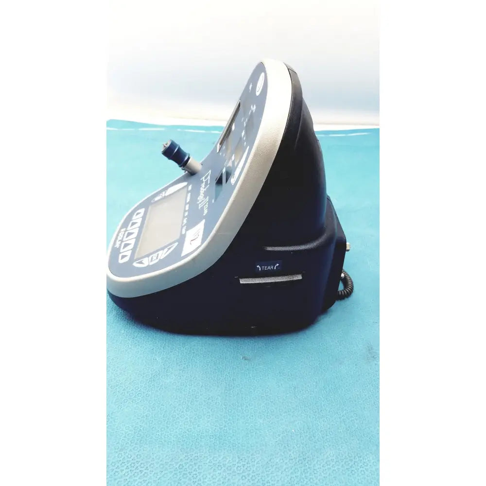 Black and silver medical-grade patient monitor colin press-mate prodigy ii 2240 with digital display and coiled cable