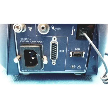 Rear panel of blue colin press-mate prodigy ii 2240 patient monitor with power input serial port and spo2 sensor connector