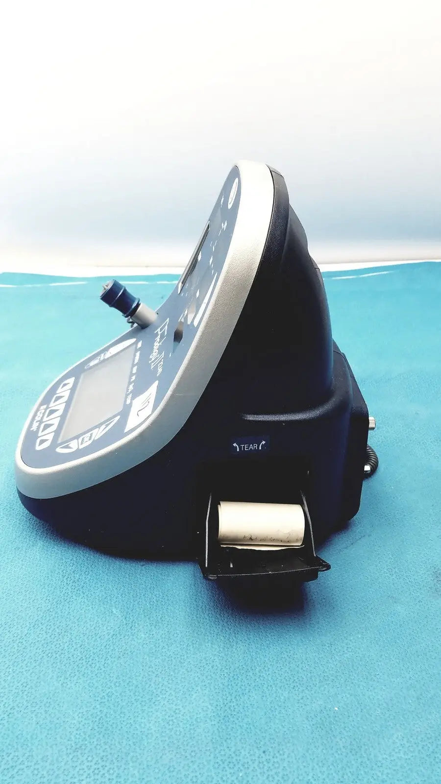 Black and silver colin press-mate prodigy ii 2240 patient monitor with digital display and paper roll for medical use
